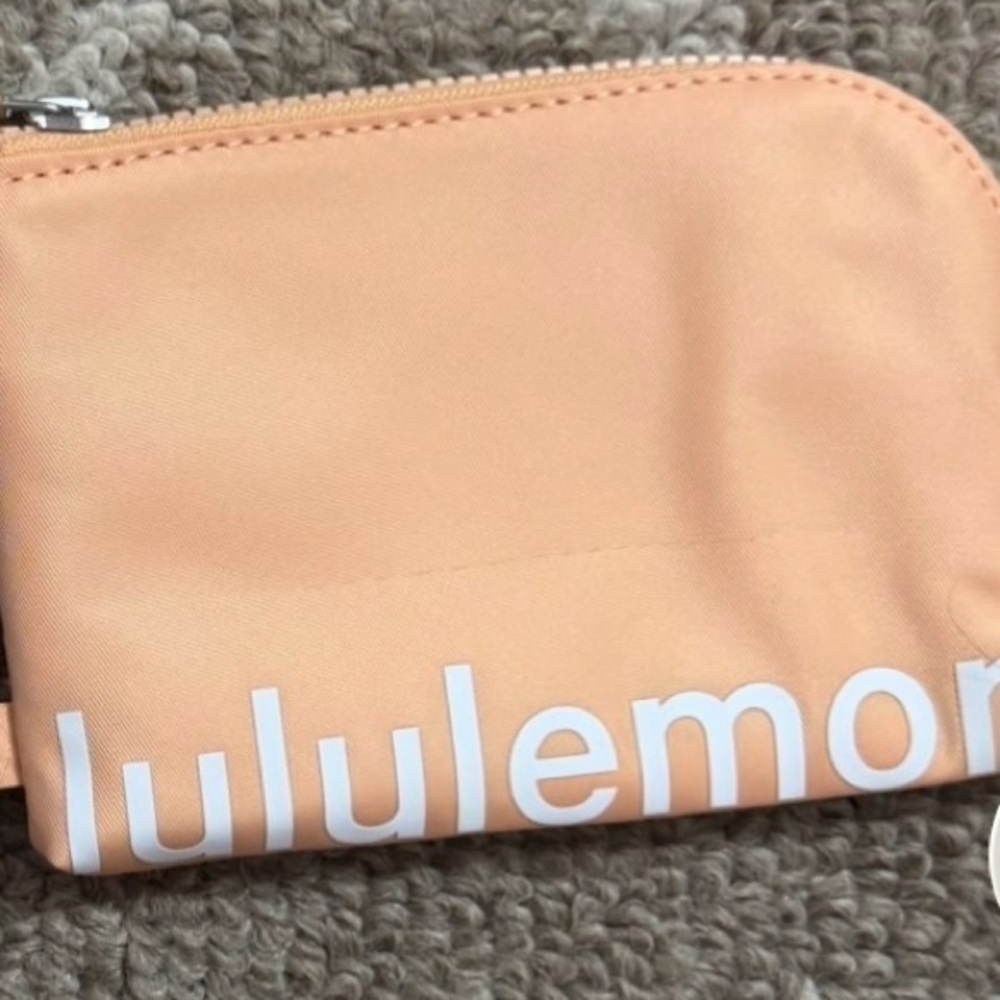 NWT Lululemon light orange Clip-On Pouch FIRM